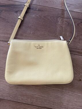 kate spade pale yellow pebbled leather crossbody bag